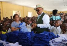 Governor Emmanuel’s aide gives new uniforms to 600 pupils