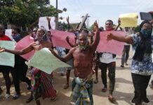 Women demanding release of prodest hotel manager, protest unclad in Rivers