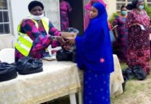 Group in Plateau distributes food items to women