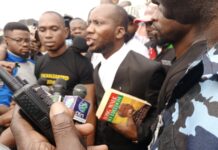Inibehe Effiong leaves prison amidst tight security, holding a Bible and Mandela’s ‘Long Walk to Freedom’